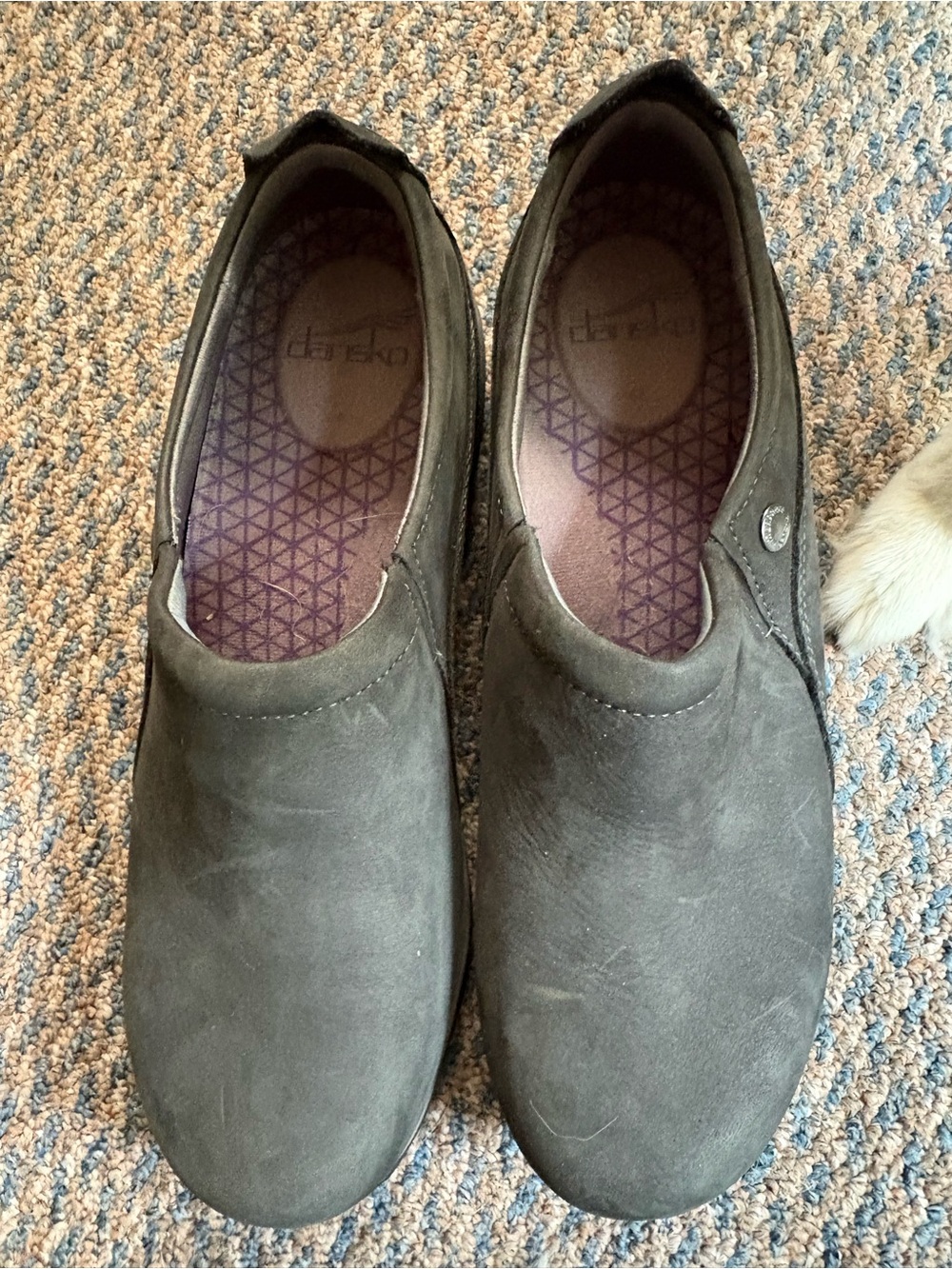 Dansko Women’s Slip-On Flats in brushed black leather Nurse shoes